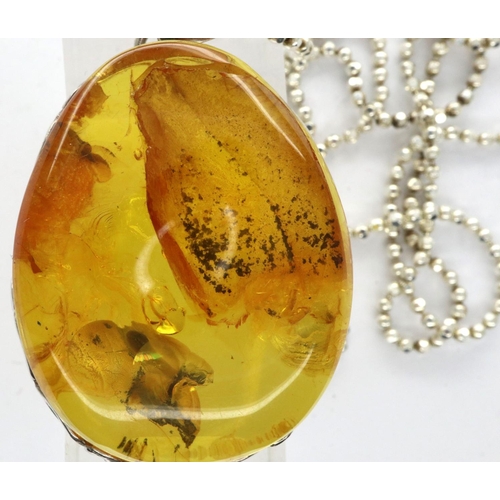 58 - Boxed 925 silver necklace with a Baltic amber pendant, chain L: 60 cm. P&P Group 1 (£14+VAT for the ... 