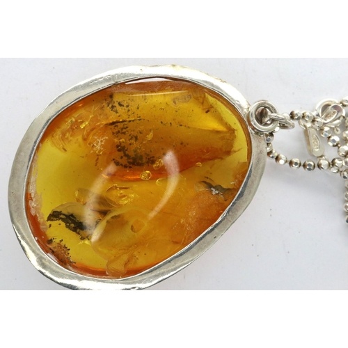 58 - Boxed 925 silver necklace with a Baltic amber pendant, chain L: 60 cm. P&P Group 1 (£14+VAT for the ... 