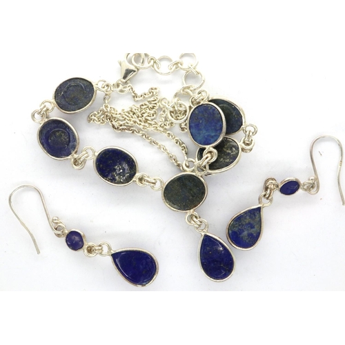 64 - Boxed 925 silver and blue stone necklace and drop earring set, chain L: 30 cm. P&P Group 1 (£14+VAT ... 