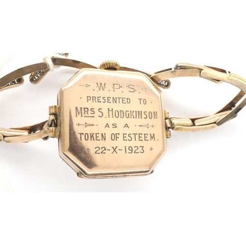 89 - Doxa: 9ct gold ladies wristwatch on a 9ct expanding bracelet with 1923 inscription, not working at l... 