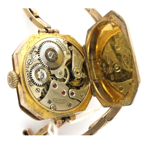 89 - Doxa: 9ct gold ladies wristwatch on a 9ct expanding bracelet with 1923 inscription, not working at l... 