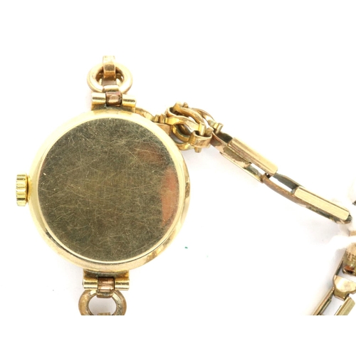 90 - Yeoman: 9ct gold gold ladies wristwatch with seconds aperture, on a rolled gold bracelet, working at... 