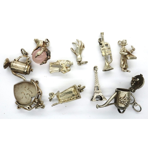 11A - Ten assorted solid silver vintage charms, combined 28g. P&P Group 1 (£14+VAT for the first lot and £... 