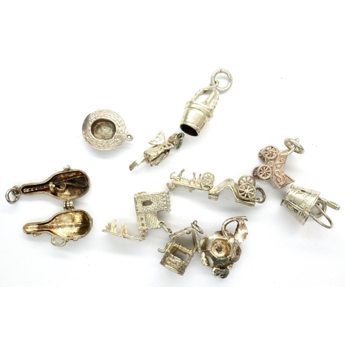 21A - Ten assorted solid silver vintage charms, combined 28g. P&P Group 1 (£14+VAT for the first lot and £... 