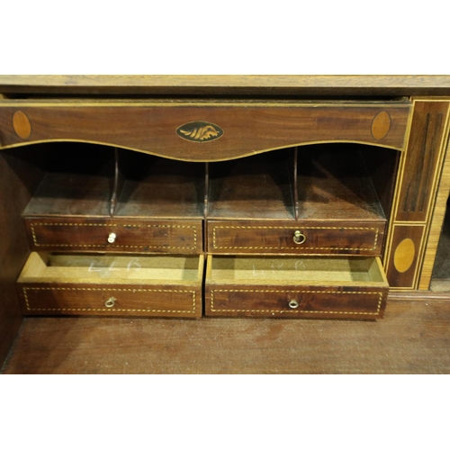 3100 - George III inlaid walnut bureau, the fall front with a complex interior of drawers, pigeon holes and... 