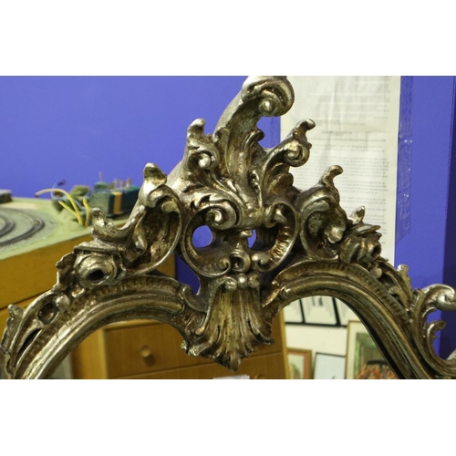 3132 - A modern Rococo wall mirror with heavily carved frame, 121 x 147 cm. Not available for in-house P&P