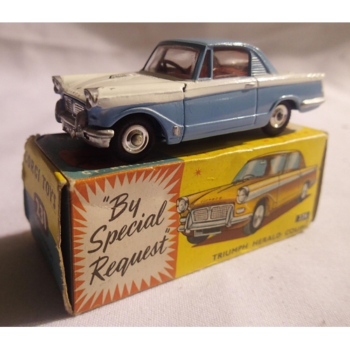 2033 - Corgi toys 231 Triumph Herald coupe, blue/white in excellent condition, box is good. P&P Group 1 (£1... 