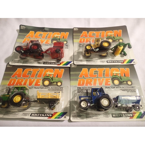 2046 - Four Britains action drive tractor and implement set in blister packs in excellent to near mint cond... 
