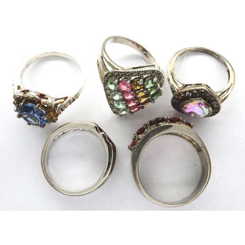 104 - Five 925 silver rings, sizes N-R. P&P Group 1 (£14+VAT for the first lot and £1+VAT for subsequent l... 