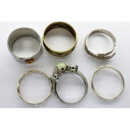 105 - Six 925 silver rings including a solitaire example sizes N-T. P&P Group 1 (£14+VAT for the first lot... 