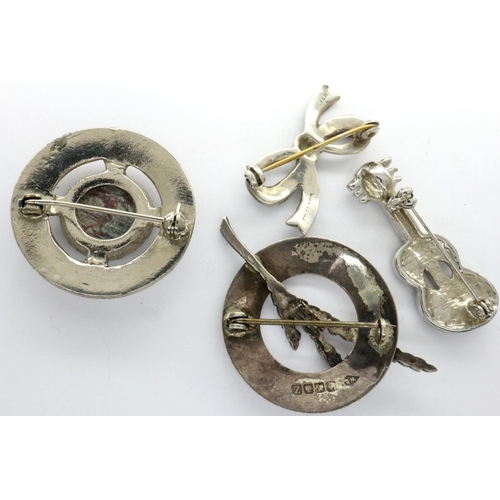 111 - Four 925 silver brooches, largest L: 43 mm. P&P Group 1 (£14+VAT for the first lot and £1+VAT for su... 