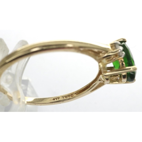 112 - 10ct gold solitaire ring set with CZ stones and a central emerald, size N/O, 1.9g. P&P Group 1 (£14+... 