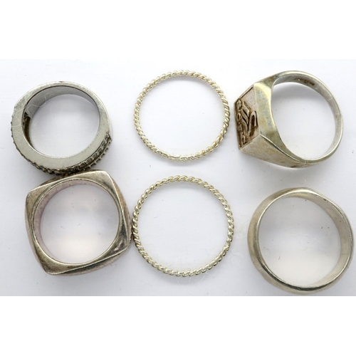 21 - Six 925 silver rings including a S.C.F.C signet ring, sizes P-Y. P&P Group 1 (£14+VAT for the first ... 