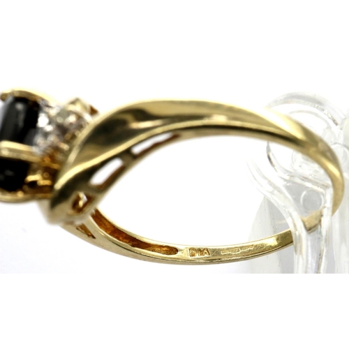 28 - 9ct gold dress ring set with a central sapphire and diamonds, size P, 2.3g. P&P Group 1 (£14+VAT for... 