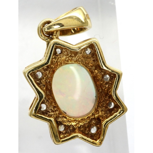 30 - 9ct gold flower pendant set with CZ stones and a central opal, L: 19 mm, 2.6g. P&P Group 1 (£14+VAT ... 