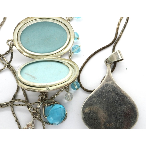 35 - Four 925 silver necklaces including a pendant locket, largest chain L: 56 cm. P&P Group 1 (£14+VAT f... 