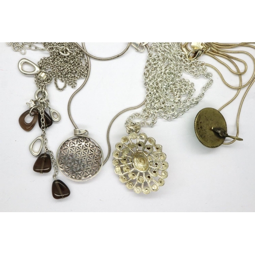 37 - Four 925 silver pendant necklaces, longest chain L: 80 cm. P&P Group 1 (£14+VAT for the first lot an... 