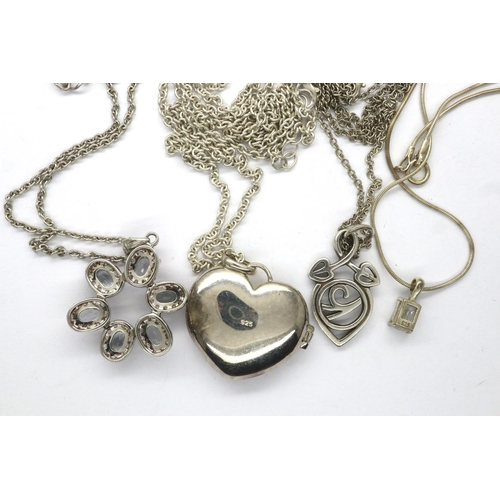 45 - Four 925 silver pendant necklaces including a locket, largest chain L: 64 cm. P&P Group 1 (£14+VAT f... 