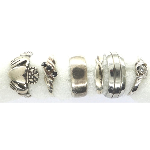 51 - Six 925 silver rings including a Claddagh ring, sizes P-V. P&P Group 1 (£14+VAT for the first lot an... 