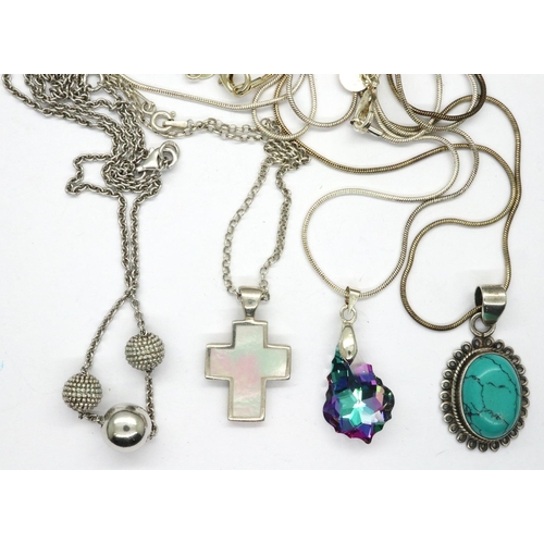 53 - Four 925 silver pendant necklaces including a cross pendant, longest chain, L: 60 cm. P&P Group 1 (£... 