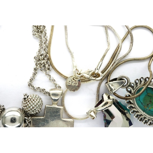 53 - Four 925 silver pendant necklaces including a cross pendant, longest chain, L: 60 cm. P&P Group 1 (£... 