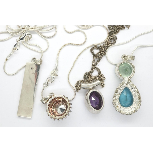 56 - Four 925 silver pendant necklaces, largest chain L: 60 cm. P&P Group 1 (£14+VAT for the first lot an... 