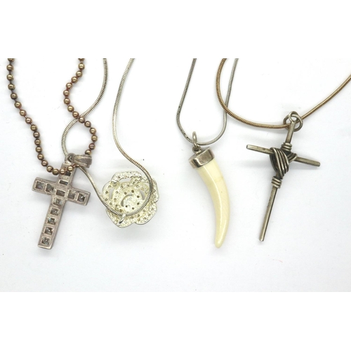 61 - Four 925 silver pendant necklaces including two with cross pendants, longest chain L: 60 cm. P&P Gro... 