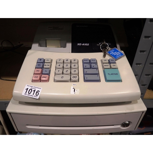 1016 - Sharp cash register XE-A102. All electrical items in this lot have been PAT tested for safety and ha... 
