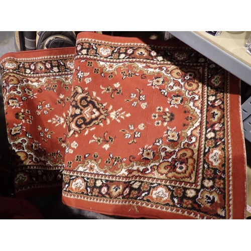 1032 - Red ground floor rug, 70 x 140 cm. Not available for in-house P&P