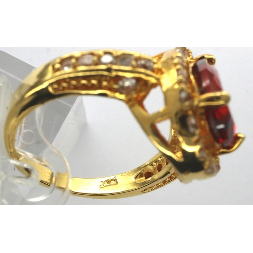 2 - 10ct gold ring set with a pear shaped garnet and CZ shoulders, size Q, 5.5g. P&P Group 1 (£14+VAT fo... 