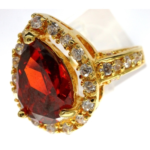 2 - 10ct gold ring set with a pear shaped garnet and CZ shoulders, size Q, 5.5g. P&P Group 1 (£14+VAT fo... 