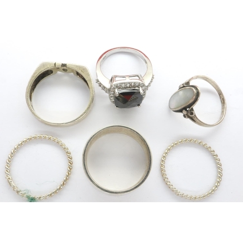 17 - Six 925 silver rings including a DAD ring, sizes O-U. P&P Group 1 (£14+VAT for the first lot and £1+... 