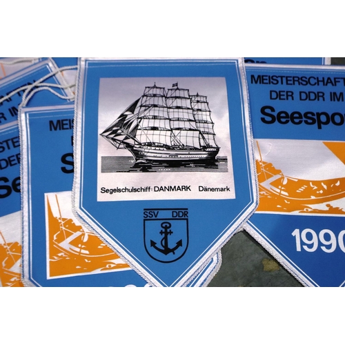 2073 - A collection of East German DDR pennants (12). P&P Group 1 (£14+VAT for the first lot and £1+VAT for... 