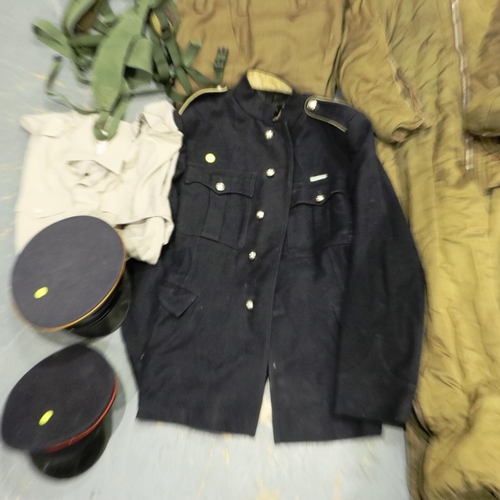 2085 - Uniforms: A Cheshire regiment dress tunic approximate size S, two caps, shirt, trousers and an insul... 