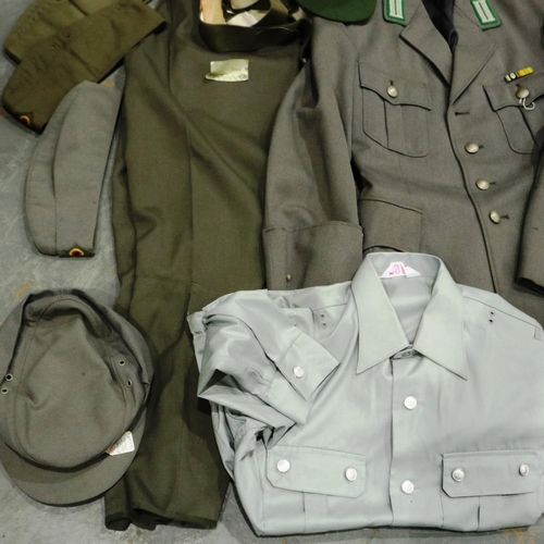 2086 - Post war German uniform components including a tunic, caps, breeches etc. P&P Group 3 (£25+VAT for t... 