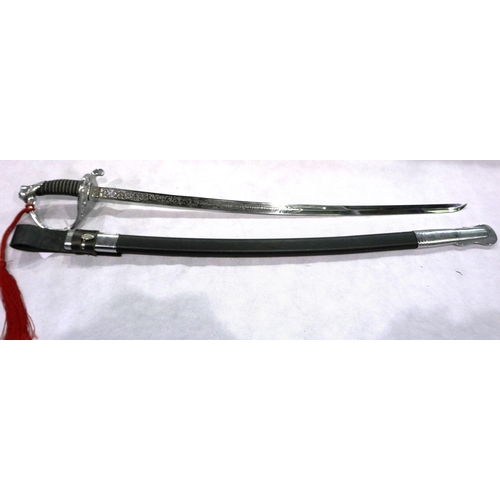 2115 - A replica US Marines dress sword with scabbard and leather frog. P&P Group 3 (£25+VAT for the first ... 