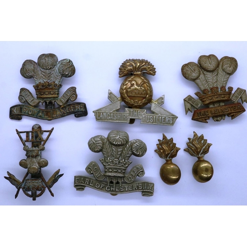 2141 - British WWI Lancashire Fusiliers cap badge with a pair of shoulder/collar flashes and two 12th Royal... 