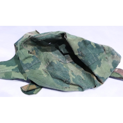 2018 - Three camouflage helmet covers, one dated 1944. P&P Group 1 (£14+VAT for the first lot and £1+VAT fo... 