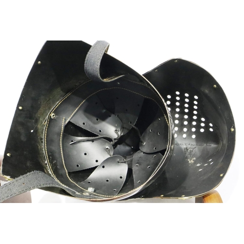 2023 - A full size steel reproduction knights helmet with visor, one rivet missing. P&P Group 2 (£18+VAT fo... 