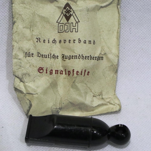 2045 - WWII German un-issued Hitler Youth whistle in original packet. P&P Group 1 (£14+VAT for the first lo... 