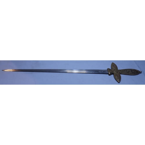 2099 - An early 20th century American presentation Liberty sword, the brass grip decorated in relief. P&P G... 