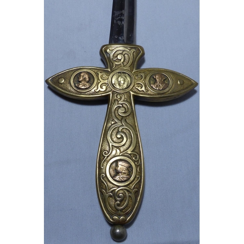 2099 - An early 20th century American presentation Liberty sword, the brass grip decorated in relief. P&P G... 