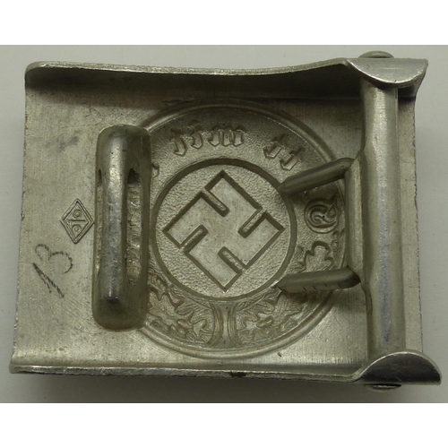 2080S - German pressed aluminium belt buckle, stamped TH with makers mark verso. P&P Group 1 (£14+VAT for th... 