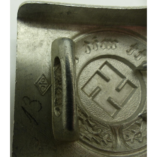 2080S - German pressed aluminium belt buckle, stamped TH with makers mark verso. P&P Group 1 (£14+VAT for th... 