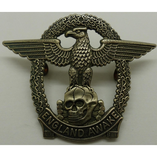 2170B - WWII anti-war pressed metal cap badge. P&P Group 1 (£14+VAT for the first lot and £1+VAT for subsequ... 