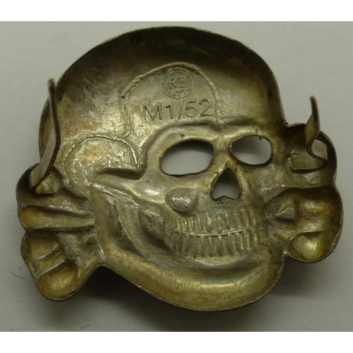 2170E - SS Totenkopf deaths head pressed metal badge. P&P Group 1 (£14+VAT for the first lot and £1+VAT for ... 