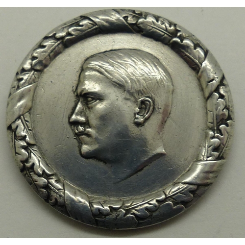 2170M - Third Reich metal badge, depicting Hitler within a wreath, marked and dated 1935-6 verso, lacking pi... 