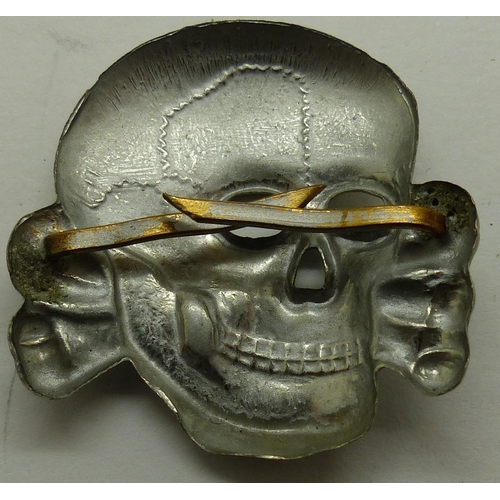 2170N - German pressed metal SS Totenkopf deaths head badge. P&P Group 1 (£14+VAT for the first lot and £1+V... 