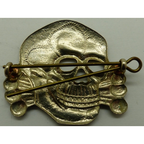 2170U - Large pressed metal SS Totenkopf deaths head cap badge. P&P Group 1 (£14+VAT for the first lot and £... 