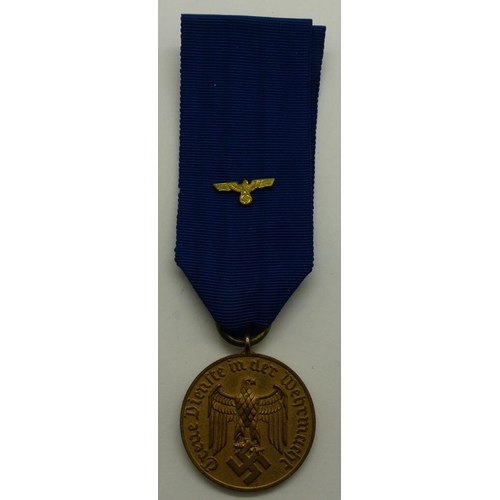 2180H - German Wehrmacht 12 Years Service medal. P&P Group 1 (£14+VAT for the first lot and £1+VAT for subse... 